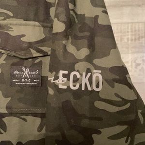 Camouflage green and black overcoat by Marc Ecko